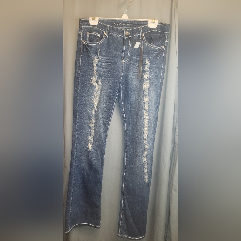 Denim ripped boot cut jeans. NWT.  Size 13/14.